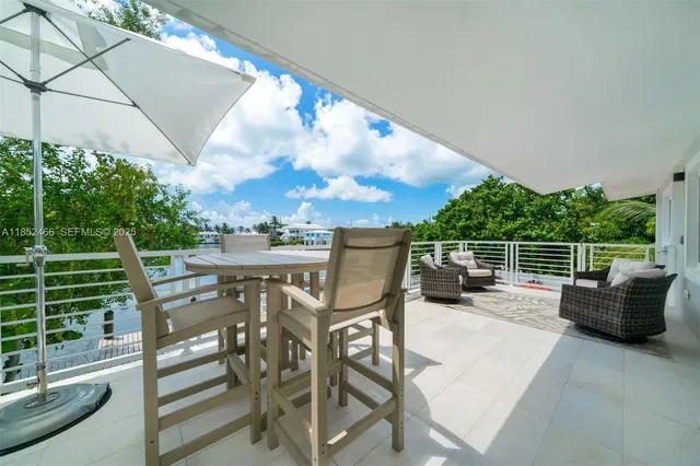 a backyard of a house with seating space