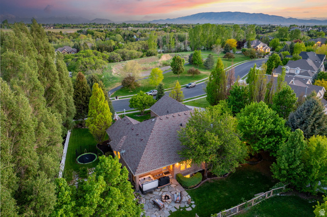 6208 West Bull River Road Highland, UT 84003 - Photo 65 of 90 Spacious property with a shingle roof, stone patio, and built-in outdoor seating