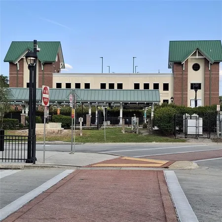 a view of a building and a yard