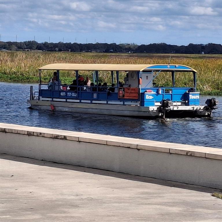 117 South Clyde Avenue Kissimmee, FL 34741 - Photo 9 of 10 a view of swimming pool with outdoor seating and yard in the back