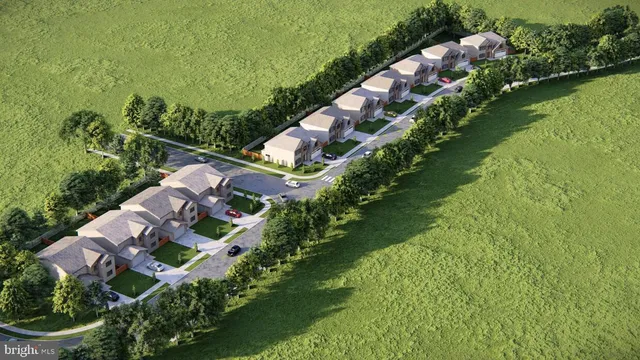 an aerial view of house with yard swimming pool and outdoor seating