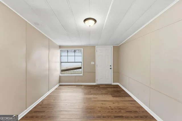 a view of livingroom with wooden floor