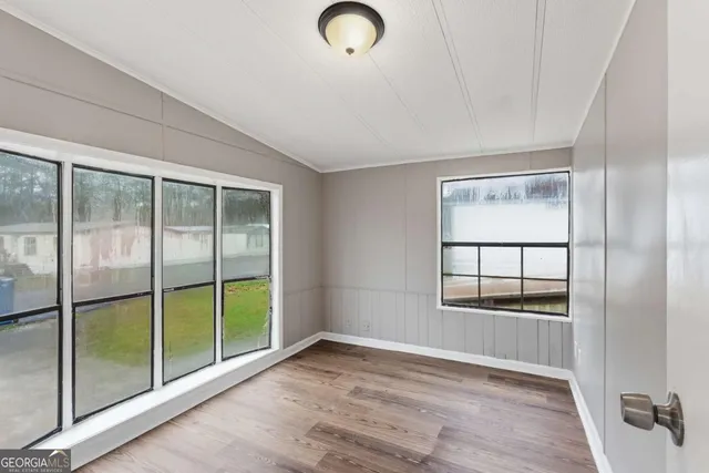 wooden floor and windows in an empty room