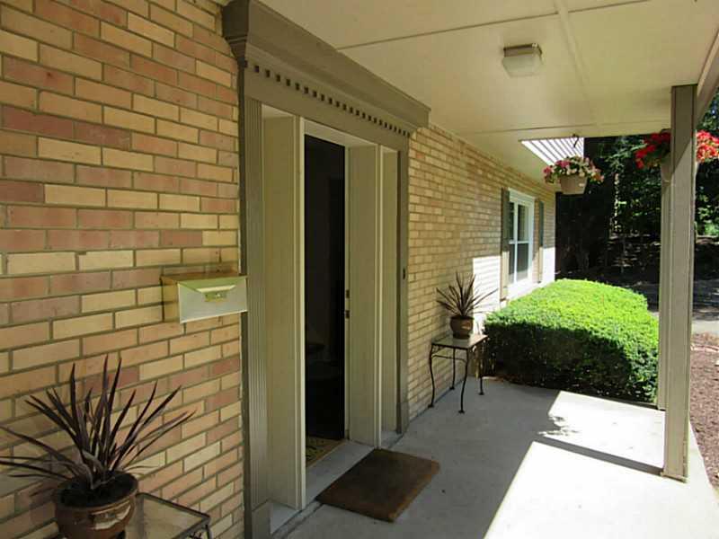 788 Scrubgrass Road Mt. Lebanon, PA 15243 - Photo 2 of 25 Exterior Front. Covered front porch is a nice place to relax with coffee and a newspaper!