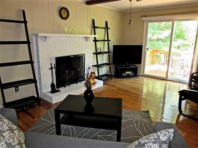 788 Scrubgrass Road Mt. Lebanon, PA 15243 - Photo 9 of 25 Family Room. Large room off kitchen with access to deck. Fireplace is nice focal point.