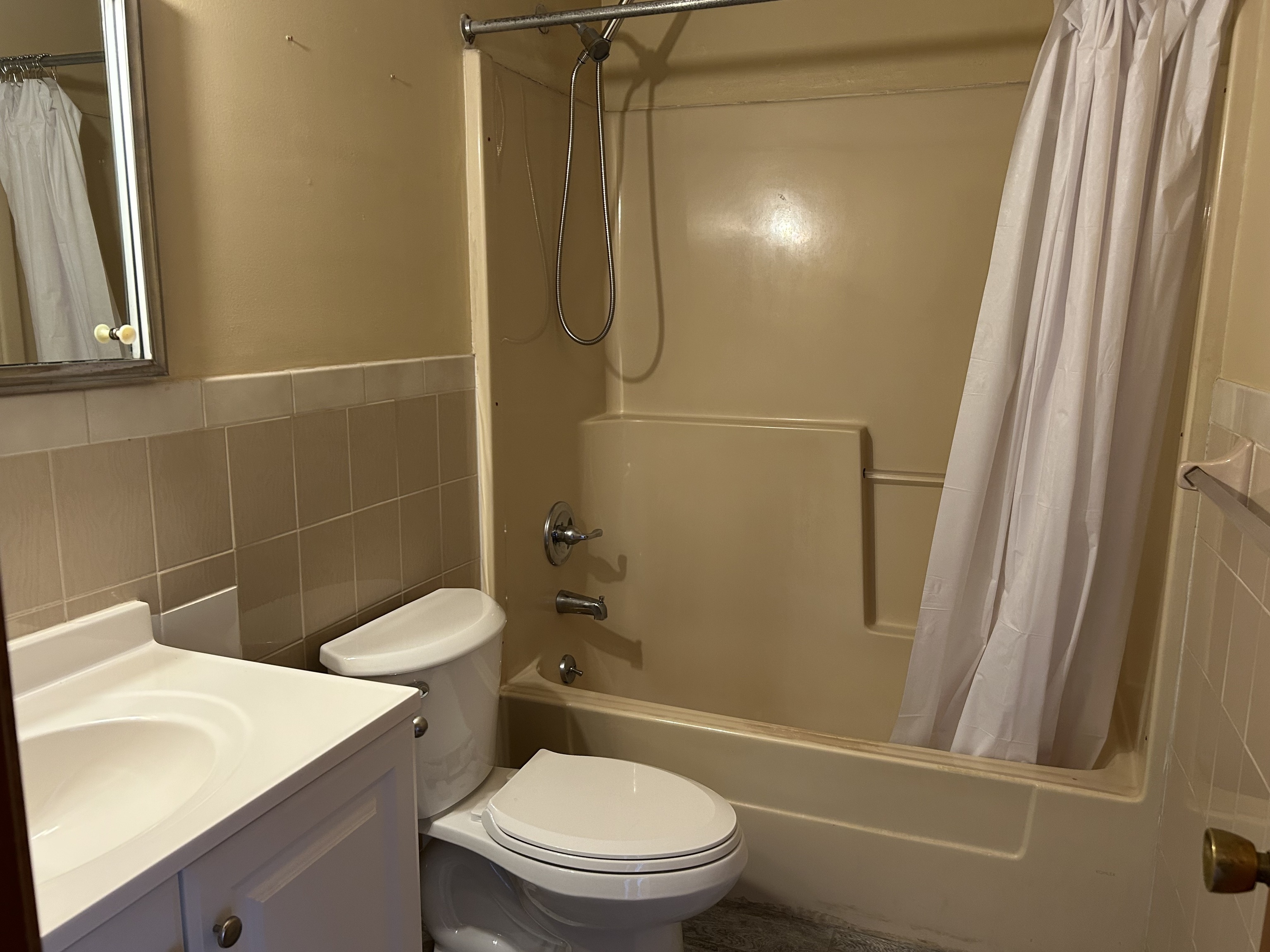 329 Scott Road, Unit B8 Waterbury, CT 06705 - Photo 11 of 16 a bathroom with a granite countertop sink toilet and shower