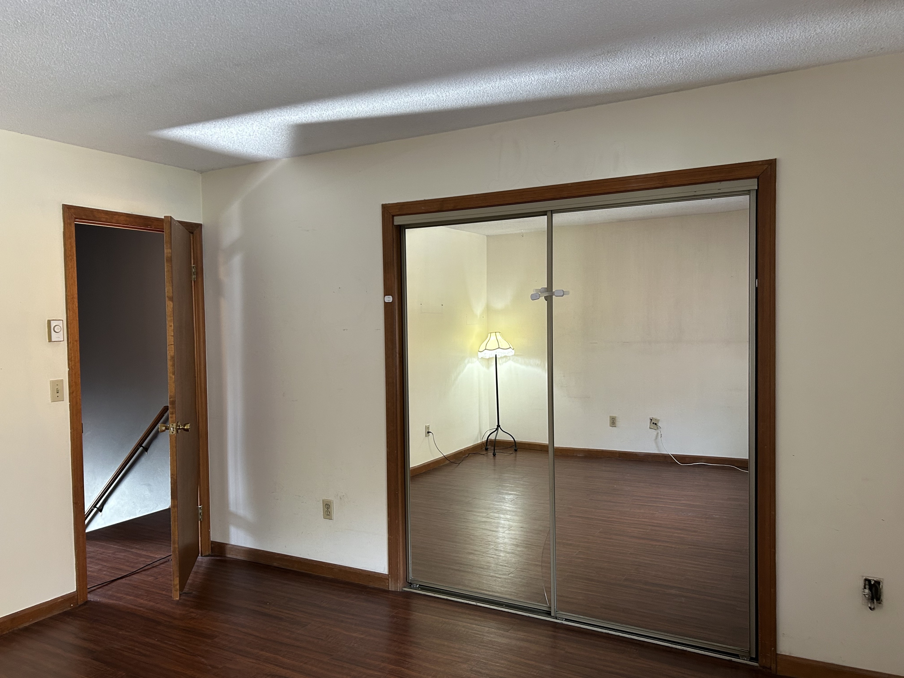 329 Scott Road, Unit B8 Waterbury, CT 06705 - Photo 9 of 16 an empty room with wooden floor and entrance