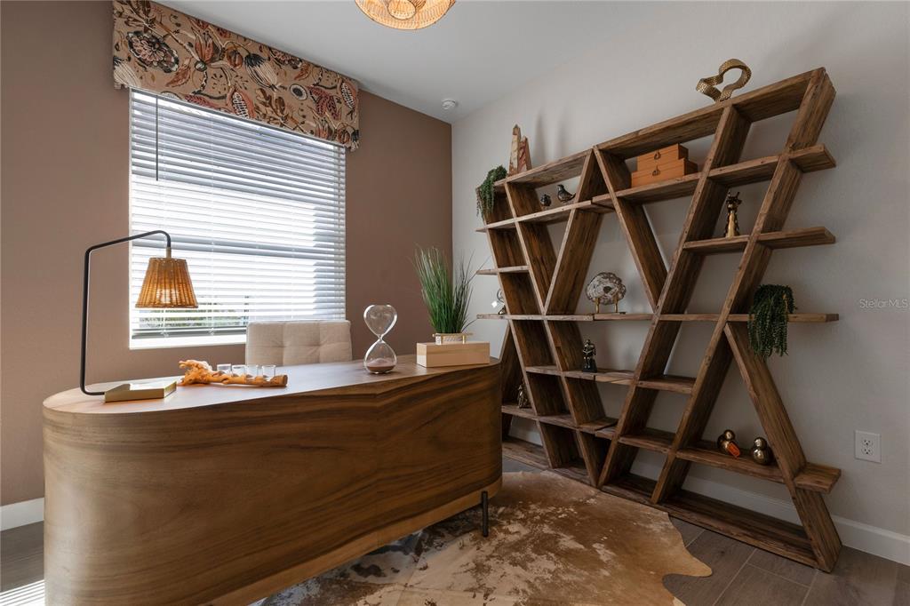 7157 Inlet Isles Lakewood Ranch, FL 34202 - Photo 16 of 26 a room with musical instruments