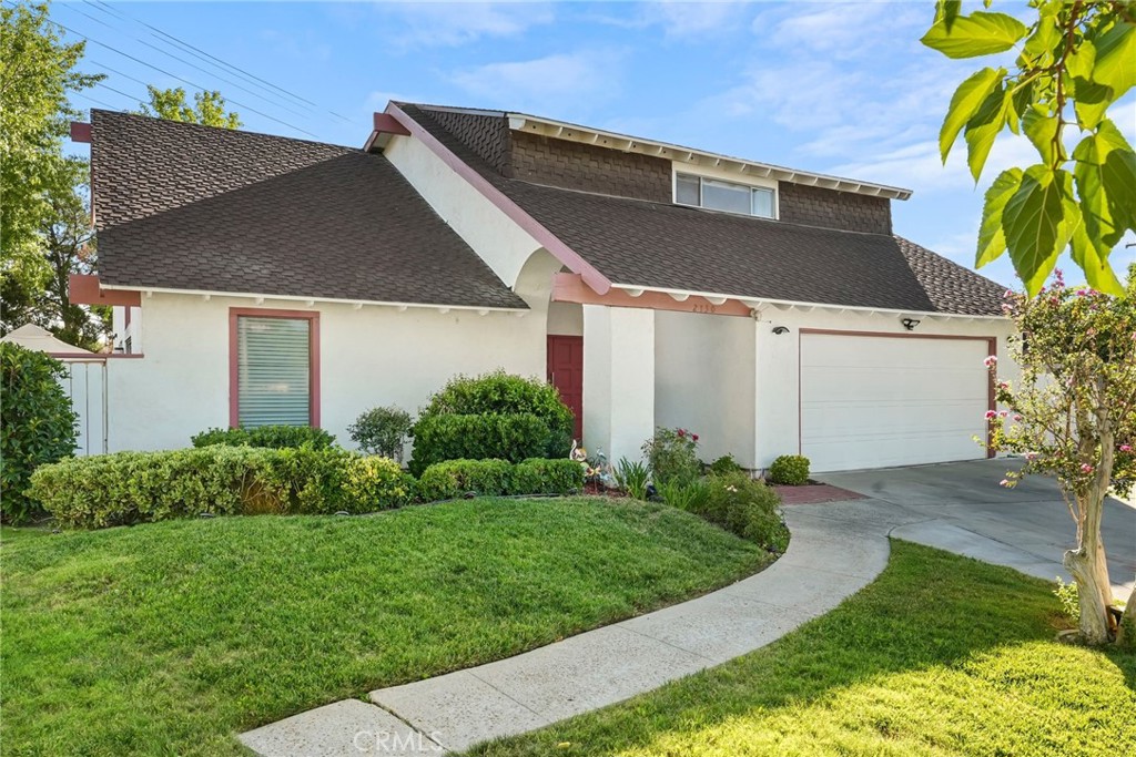 2130 Spice Street Lancaster, CA 93536 - Photo 1 of 45 a front view of a house with a yard