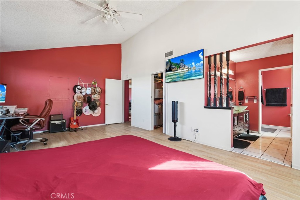 2130 Spice Street Lancaster, CA 93536 - Photo 22 of 45 a bed room with a bed and a mirror