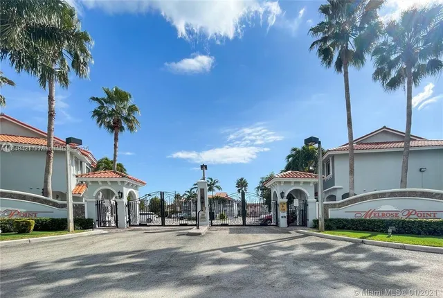 a view of a street in front of a building