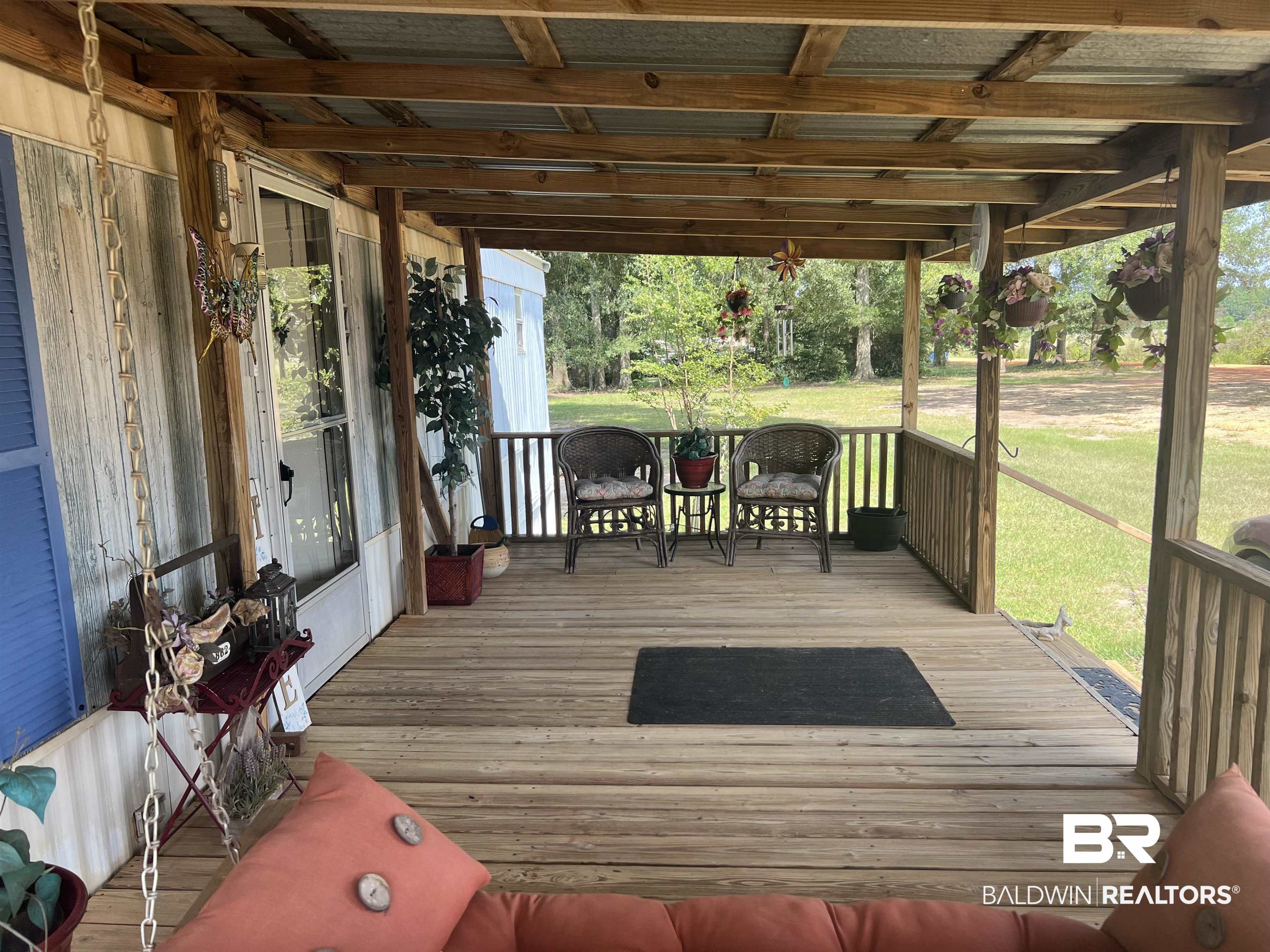 1177 McMillan Road Monroeville, AL 36460 - Photo 18 of 21 Deck with a lawn
