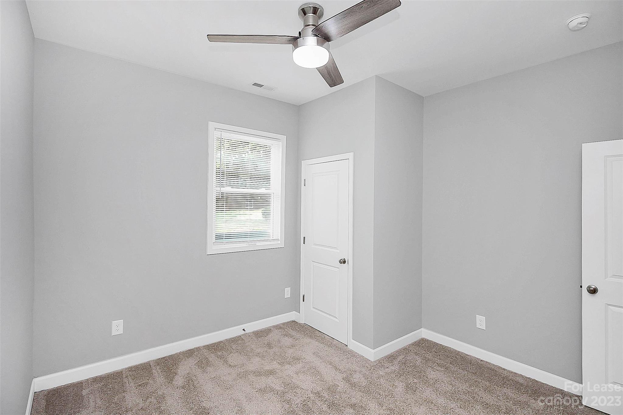 2301 Centergrove Road, Unit A Kannapolis, NC 28083 - Photo 7 of 12 a view of an empty room with a window