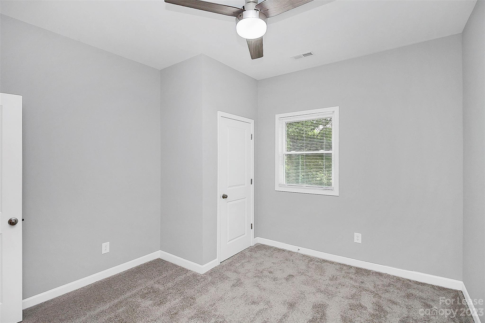 2301 Centergrove Road, Unit A Kannapolis, NC 28083 - Photo 9 of 12 a view of an empty room with a window