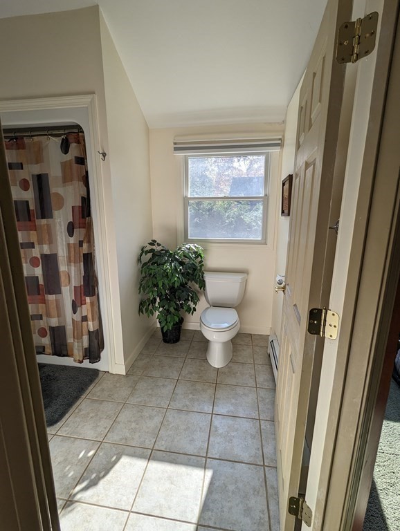 142 Clay Pond Road Bourne, MA 02532 - Photo 17 of 42 a bathroom with a toilet and a shower