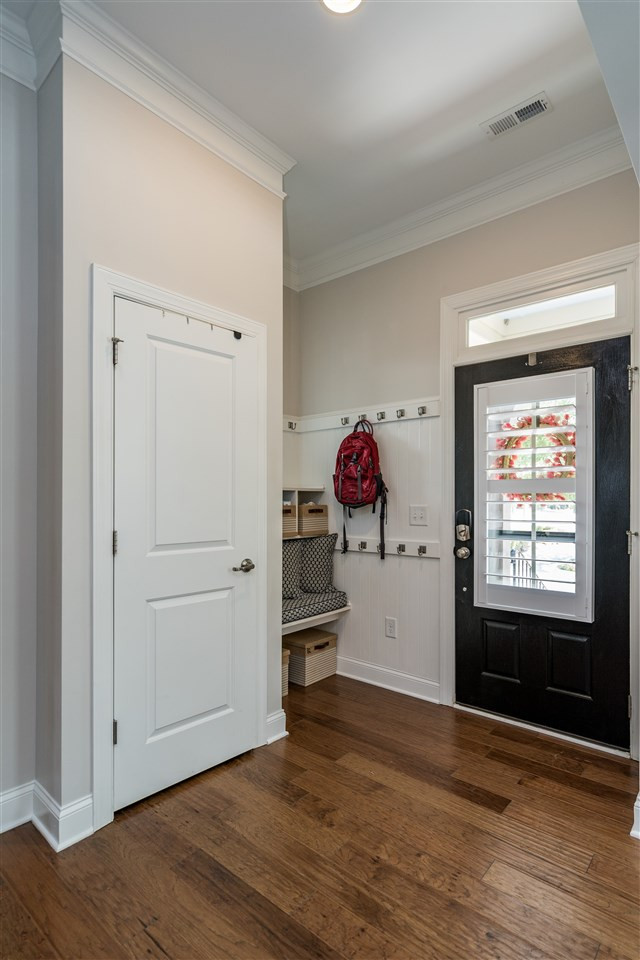 1400 Van Page Boulevard Raleigh, NC 27607 - Photo 4 of 30 Entryway with mudroom, coat closet, 10' ceilings and hardwoods! Foyer