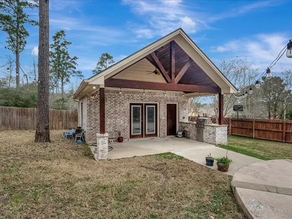 a view of a house with a patio