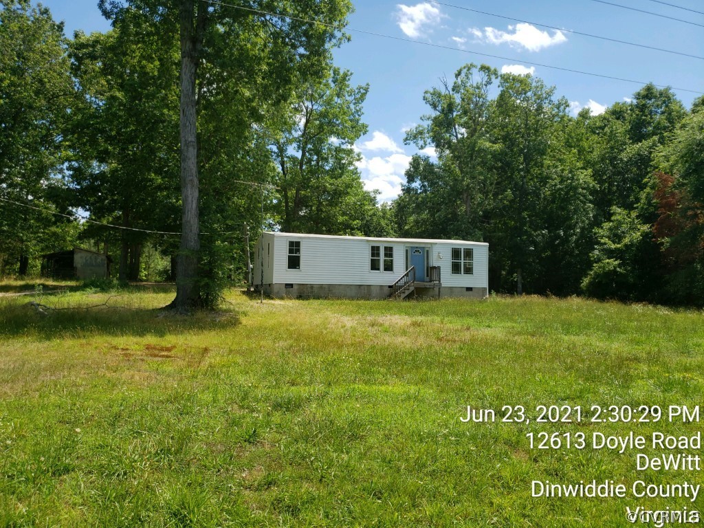 12613 Doyle Road Dewitt, VA 23840 - Photo 1 of 22 a house view with a outdoor space