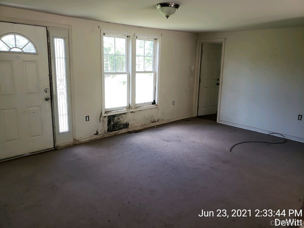 12613 Doyle Road Dewitt, VA 23840 - Photo 12 of 22 an empty room with windows