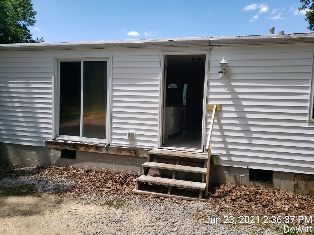 12613 Doyle Road Dewitt, VA 23840 - Photo 20 of 22 a front view of a house with stairs