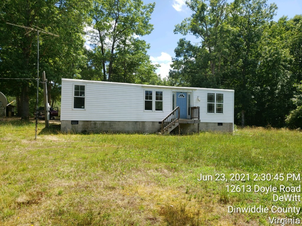 12613 Doyle Road Dewitt, VA 23840 - Photo 2 of 22 a house view with swimming pool
