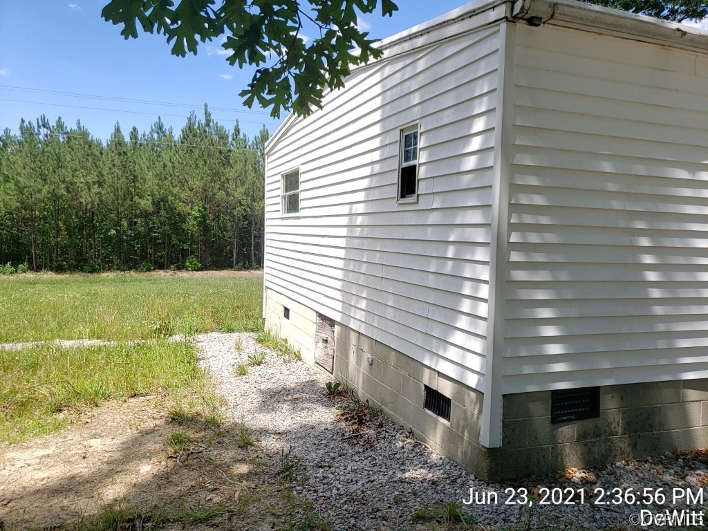 12613 Doyle Road Dewitt, VA 23840 - Photo 22 of 22 a view of a backyard with plants