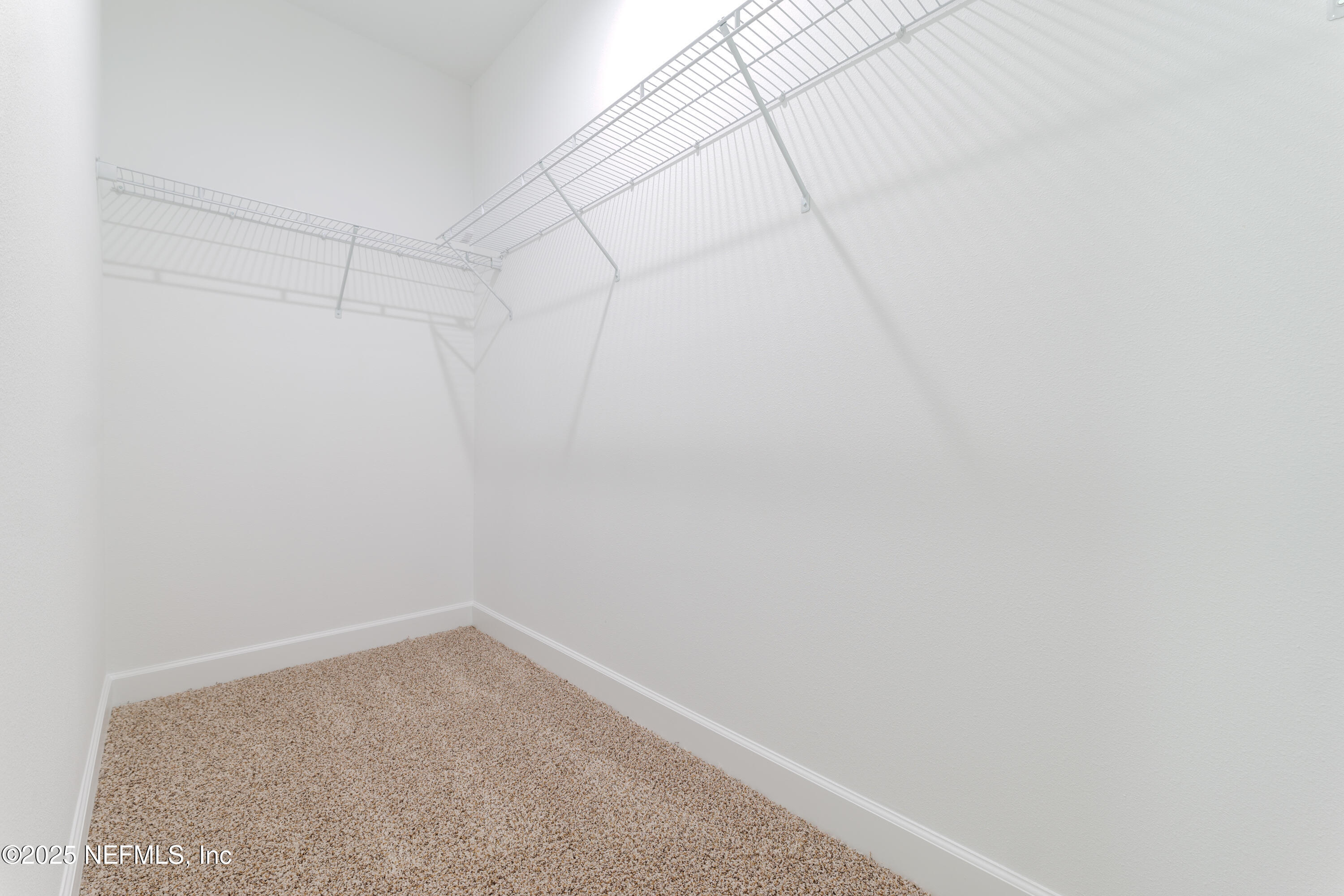 7596 Silver Sands Road Keystone Heights, FL 32656 - Photo 14 of 26 a room that has a window in it