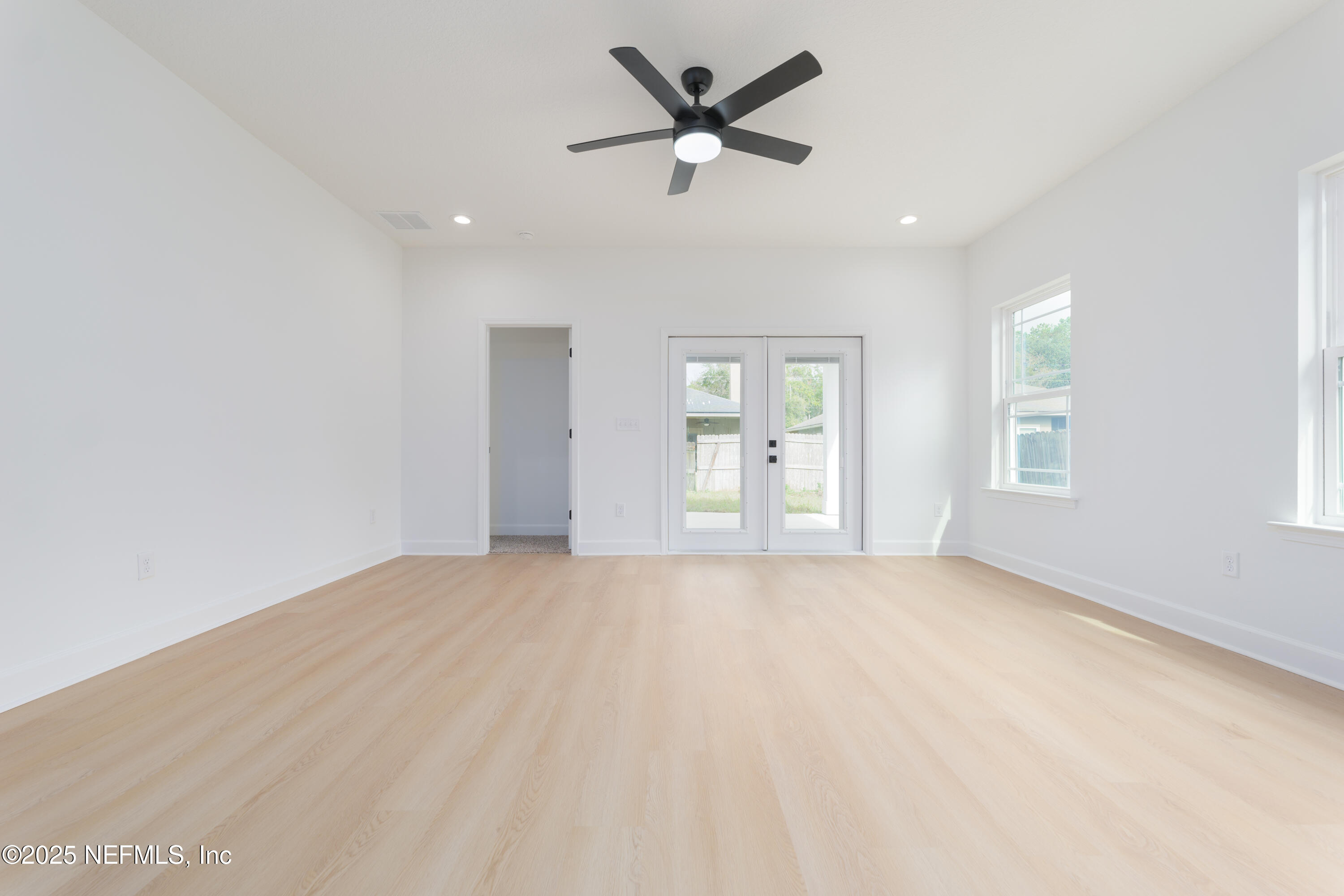 7596 Silver Sands Road Keystone Heights, FL 32656 - Photo 10 of 26 a view of an empty room with a window