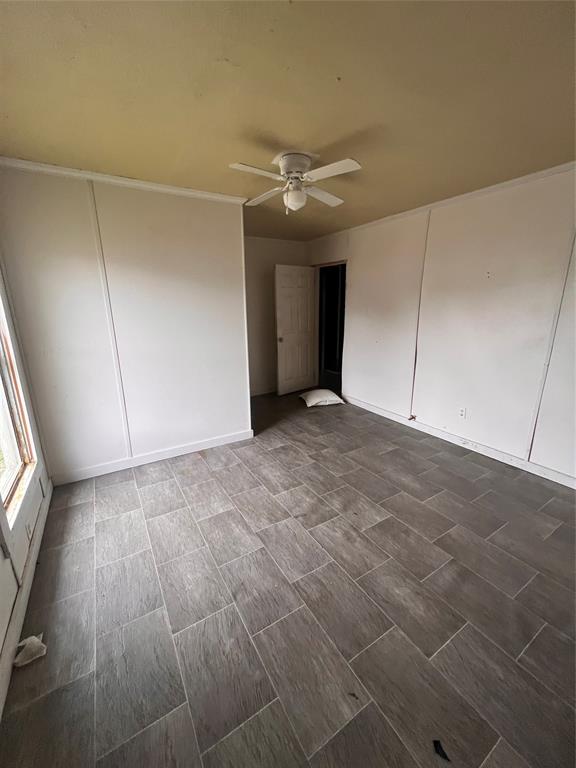 206 Third Street Hillsboro, TX 76645 - Photo 12 of 14 a view of an empty room with a window