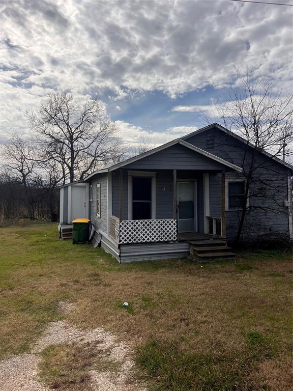 206 Third Street Hillsboro, TX 76645 - Photo 3 of 14 a view of a house with a yard