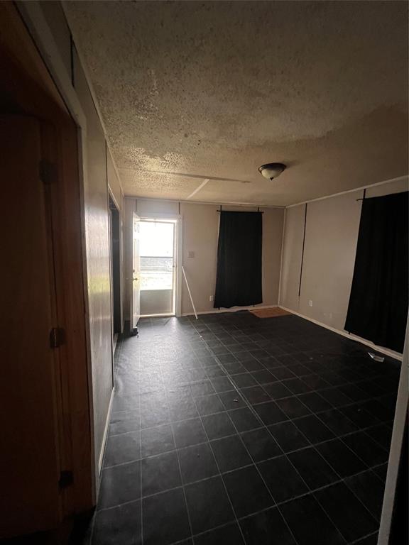 206 Third Street Hillsboro, TX 76645 - Photo 8 of 14 a view of an empty room