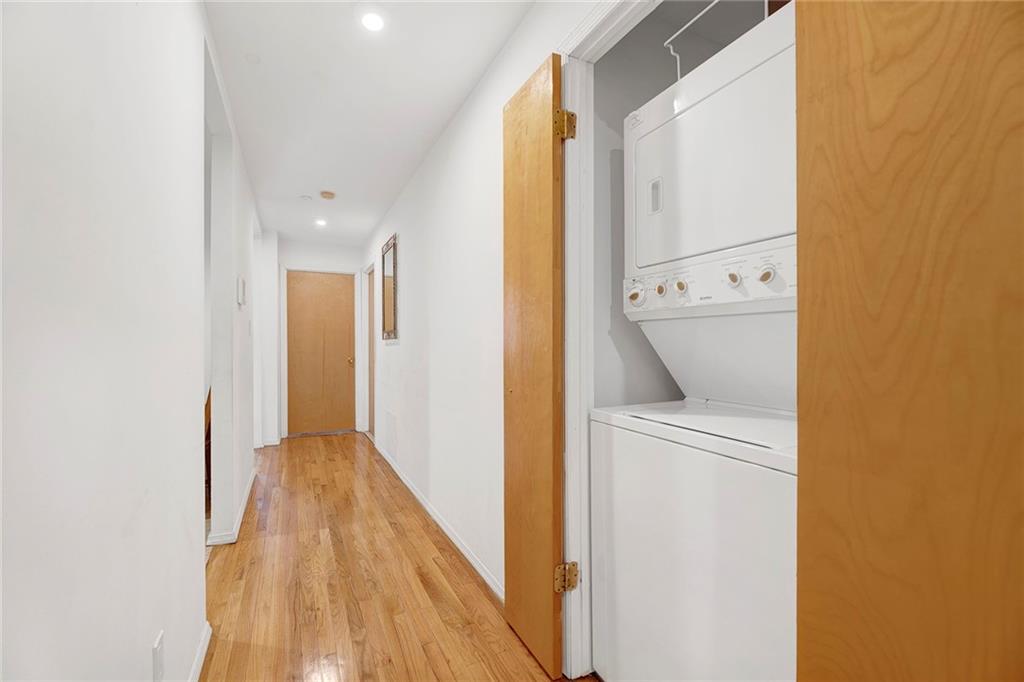 202 Quentin Road, Unit 2B Brooklyn, NY 11223 - Photo 12 of 16 a view of hallway with wooden floor