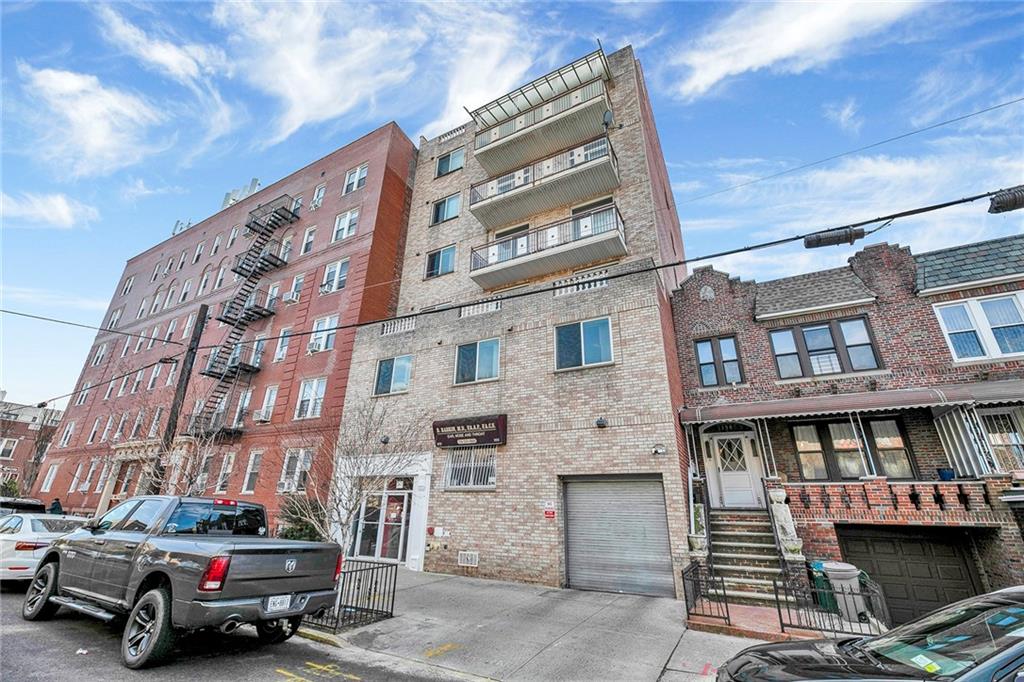 202 Quentin Road, Unit 2B Brooklyn, NY 11223 - Photo 14 of 16 a car parked in front of a building