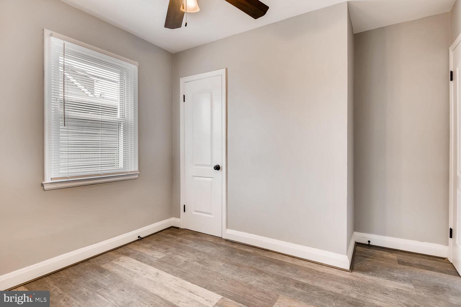 3501 Louth Road Baltimore, MD 21222 - Photo 11 of 27 an empty room with windows and closet