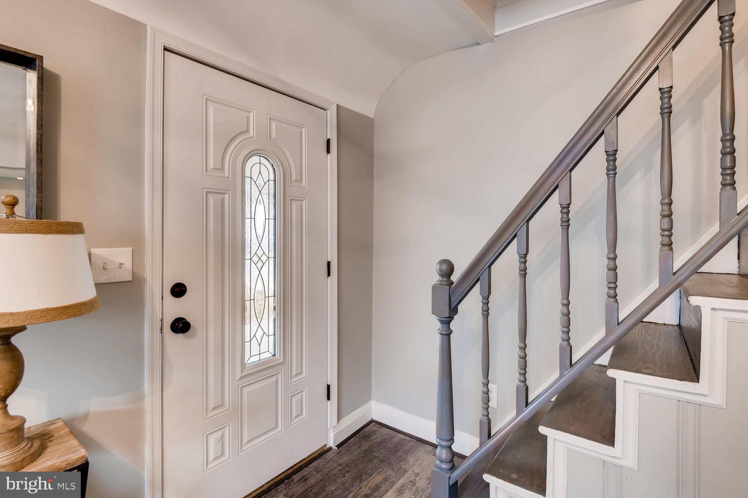 3501 Louth Road Baltimore, MD 21222 - Photo 27 of 27 a view of a hallway with wooden floor and staircase
