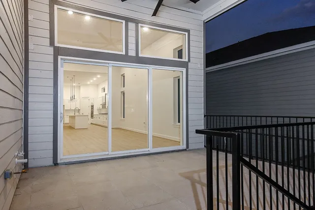 a view of a balcony with a door
