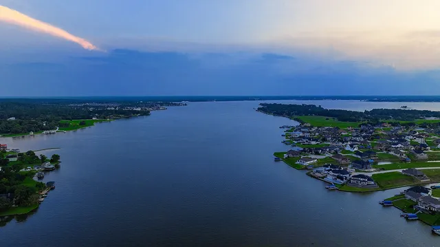 an aerial view of a houses with outdoor space