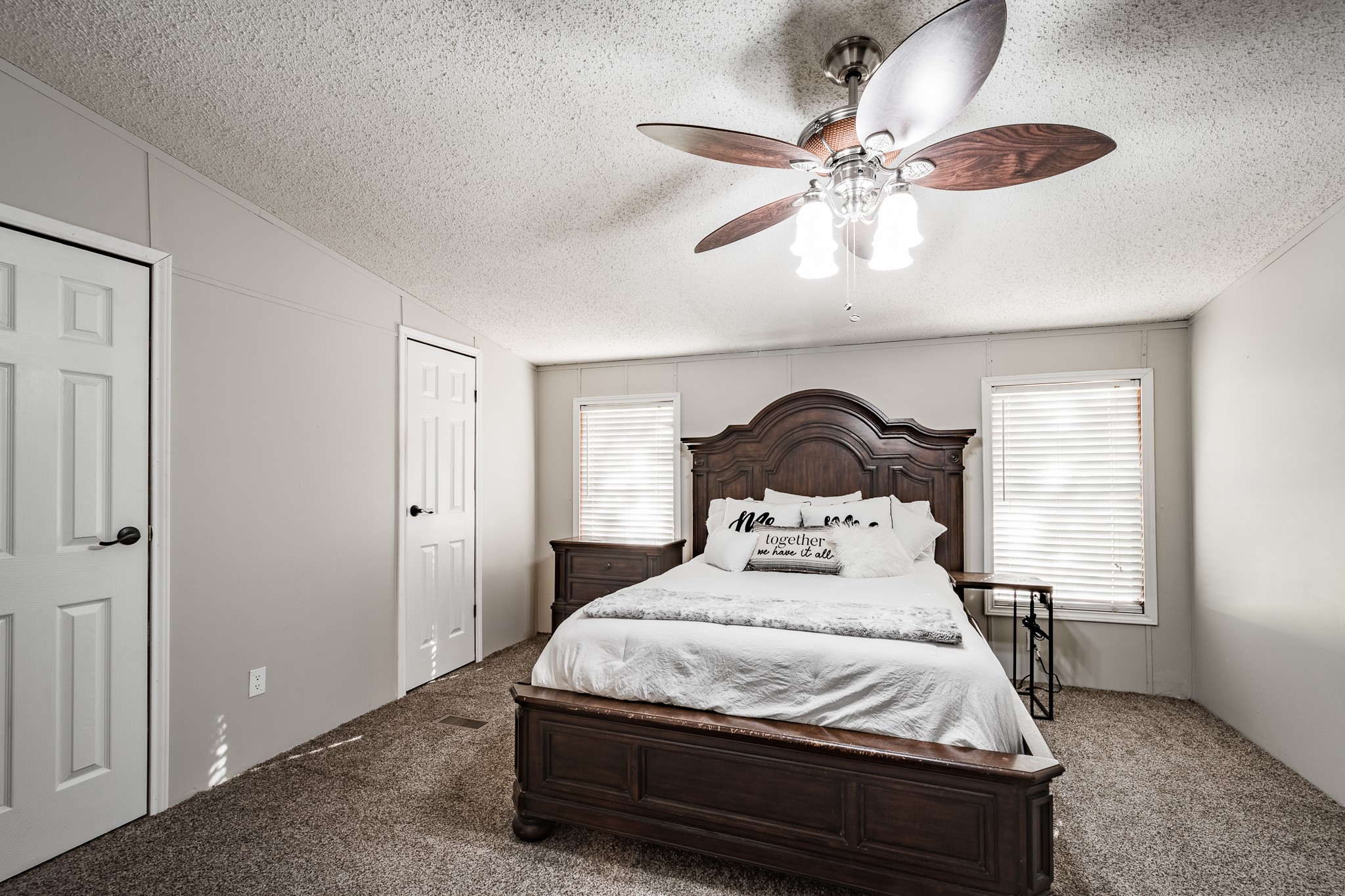 24274 Enloe Road Porter, TX 77365 - Photo 17 of 29 a bedroom with a bed and ceiling fan