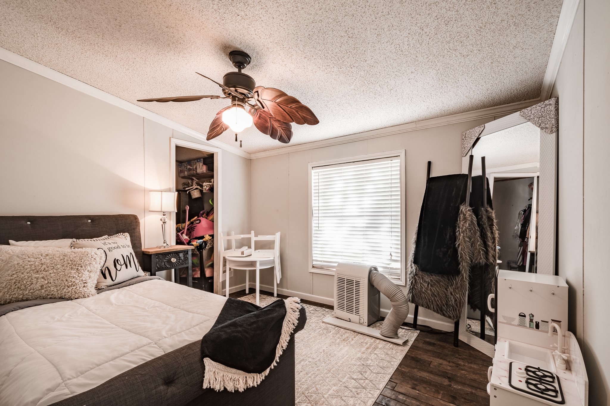 24274 Enloe Road Porter, TX 77365 - Photo 20 of 29 a bedroom with a bed and a window