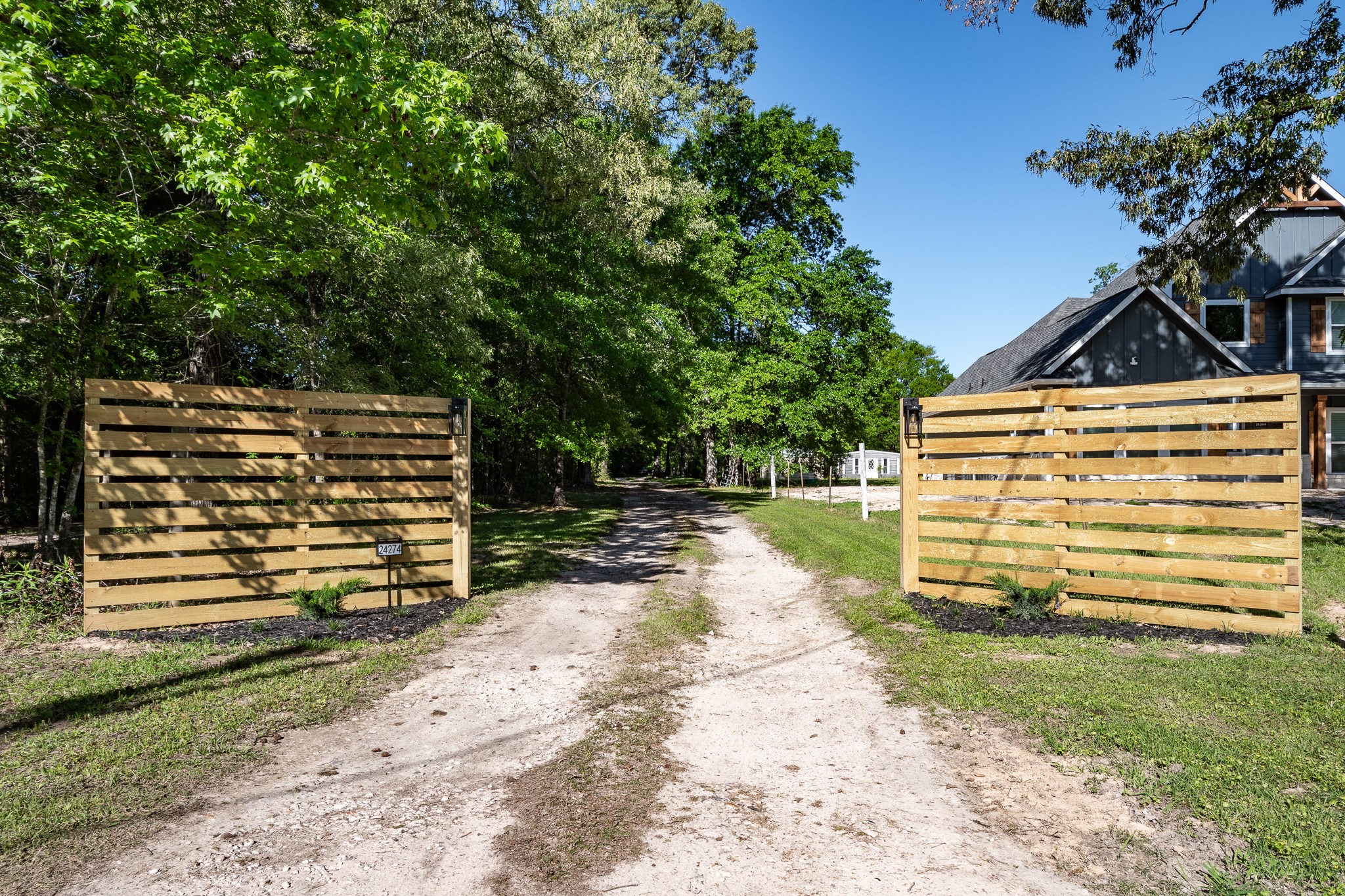 24274 Enloe Road Porter, TX 77365 - Photo 23 of 29 a view of a back yard of the house