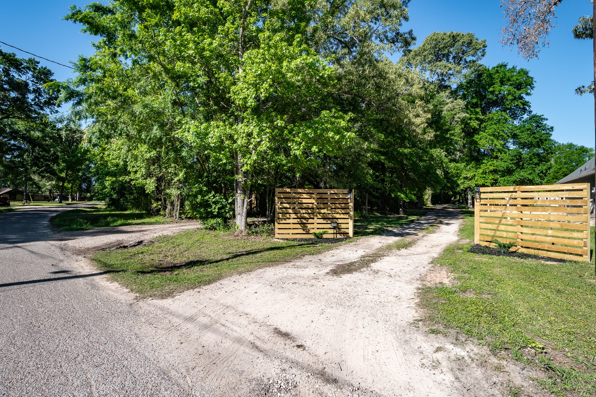 24274 Enloe Road Porter, TX 77365 - Photo 29 of 29 a front view of a house with a yard