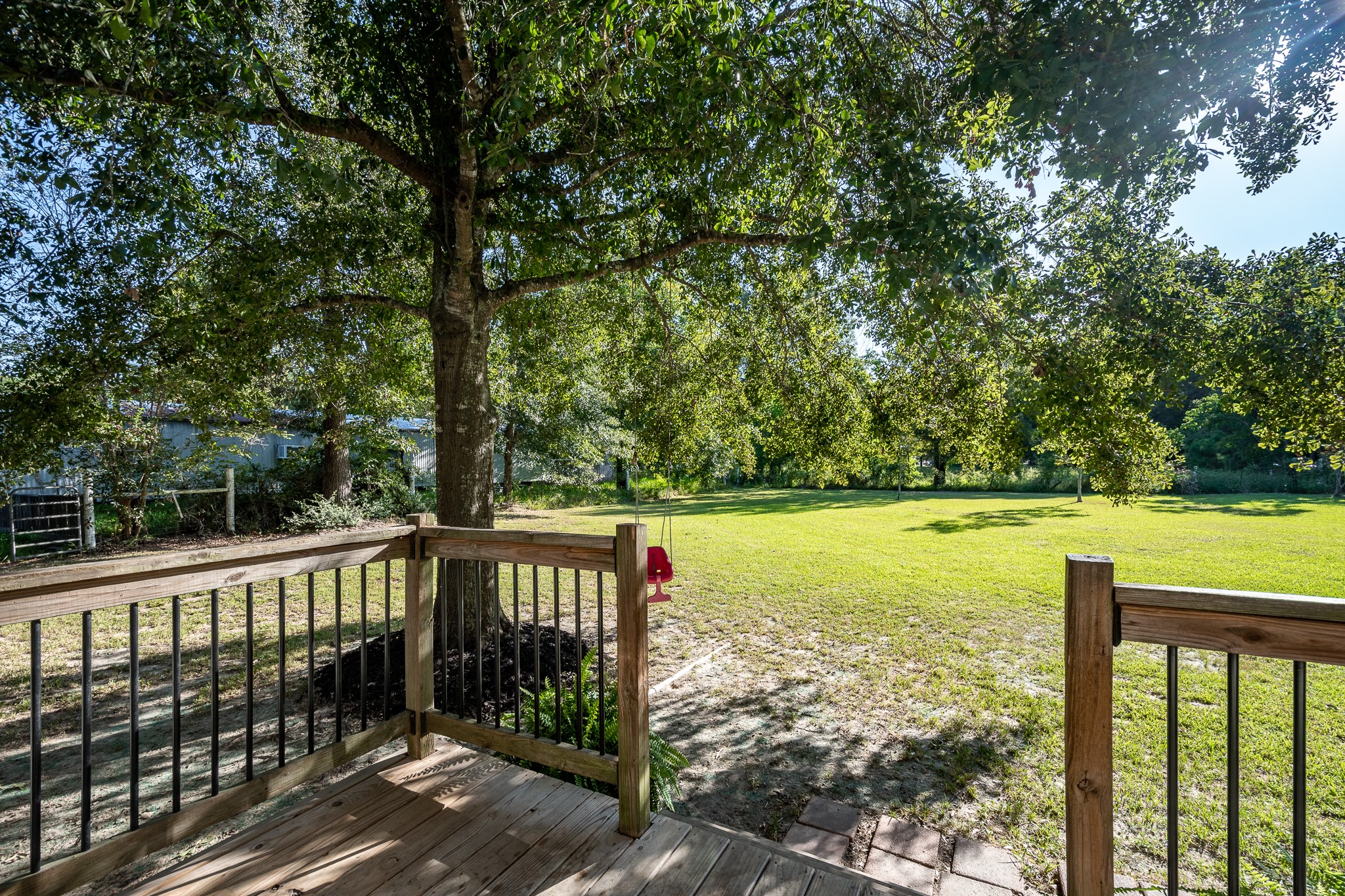 24274 Enloe Road Porter, TX 77365 - Photo 6 of 29 a view of a balcony with lake