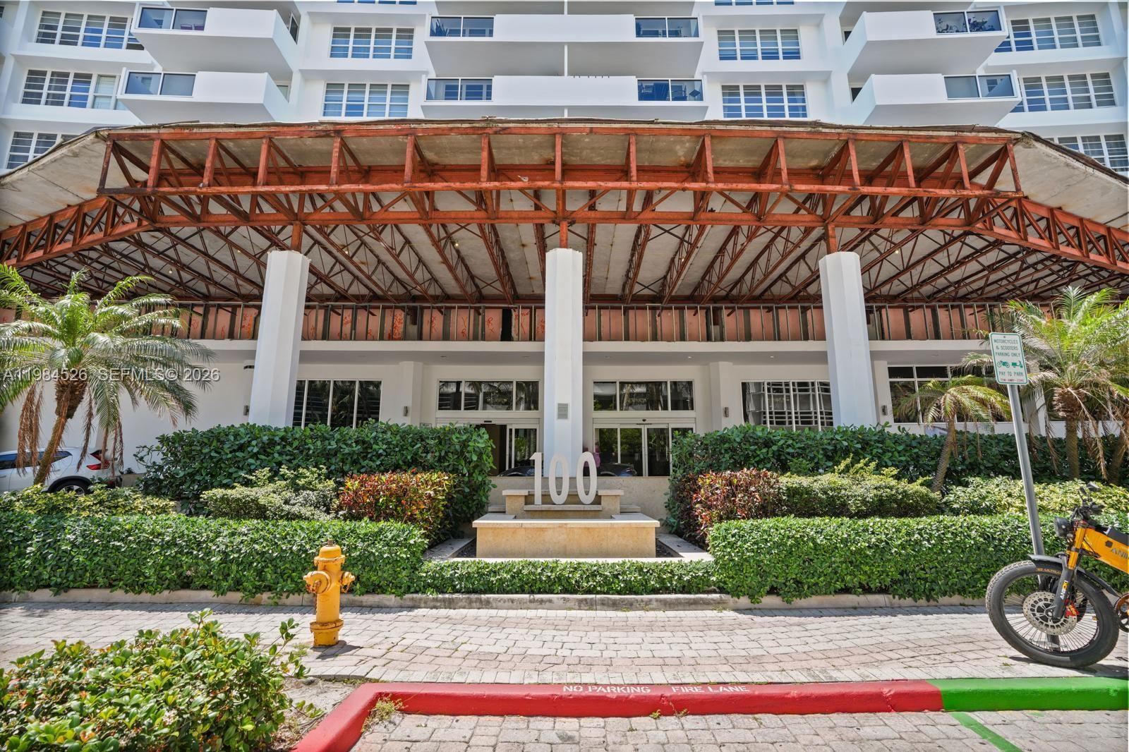 100 Lincoln Road, Unit 825 Miami Beach, FL 33139 - Photo 25 of 51 a front view of a building with garden