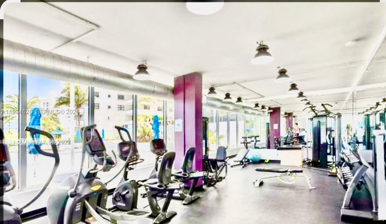 100 Lincoln Road, Unit 825 Miami Beach, FL 33139 - Photo 28 of 51 a view of a room with gym equipment