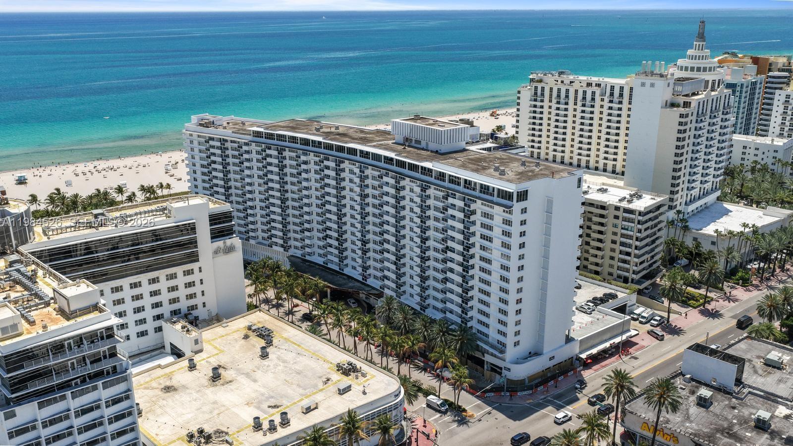 100 Lincoln Road, Unit 825 Miami Beach, FL 33139 - Photo 36 of 51 a view of a balcony with wooden floor