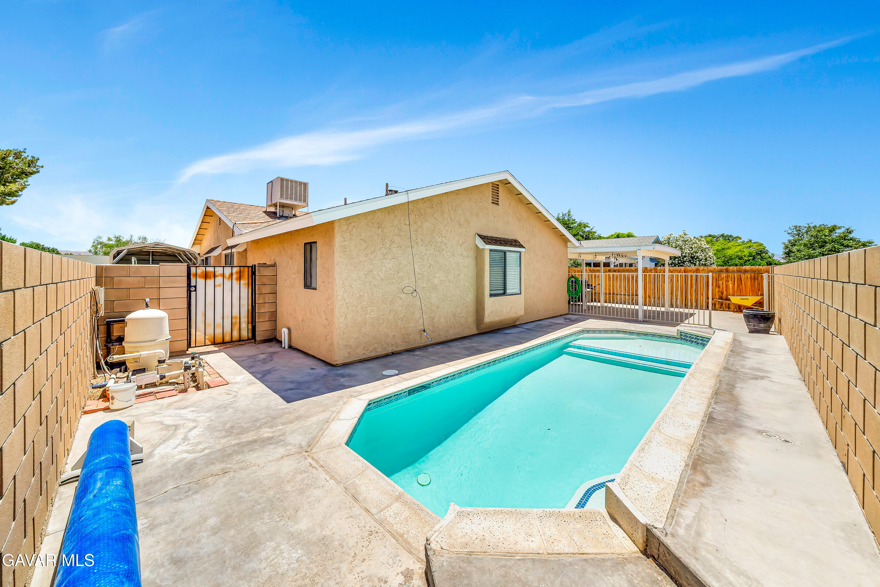 729 North Sunland Drive Ridgecrest, CA 93555 - Photo 2 of 52 a view of swimming pool with a lounge chairs