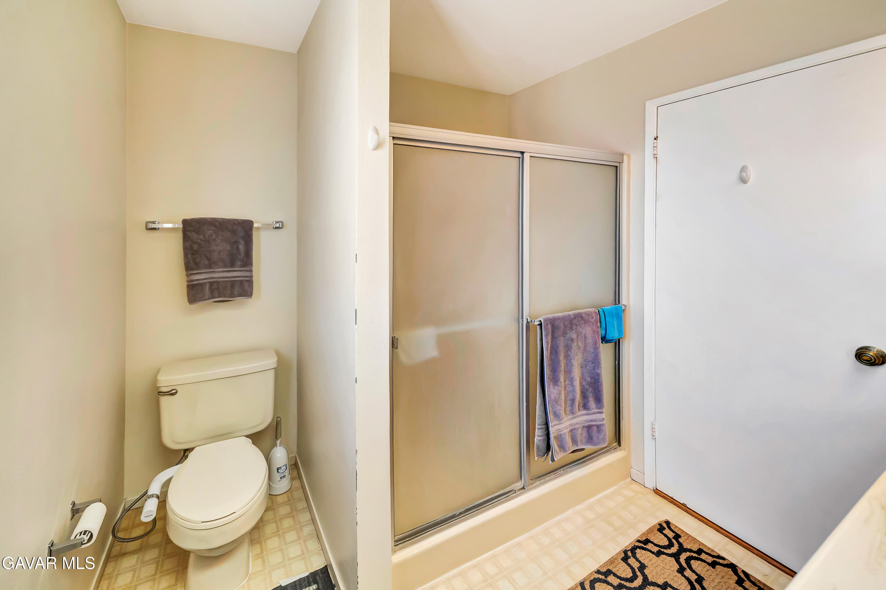 729 North Sunland Drive Ridgecrest, CA 93555 - Photo 28 of 52 a bathroom with a toilet and a shower