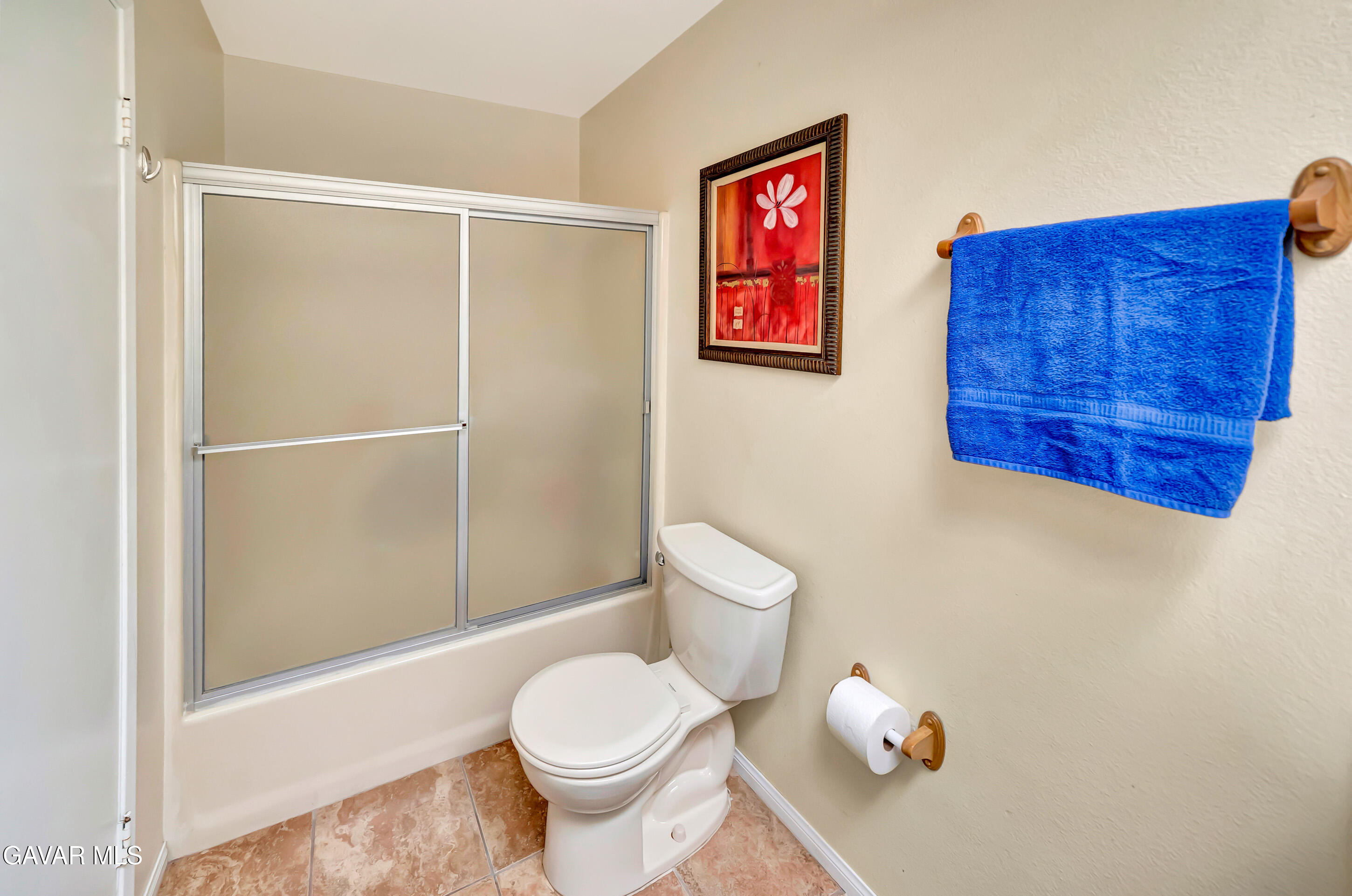 729 North Sunland Drive Ridgecrest, CA 93555 - Photo 32 of 52 a bathroom with a toilet and a shower