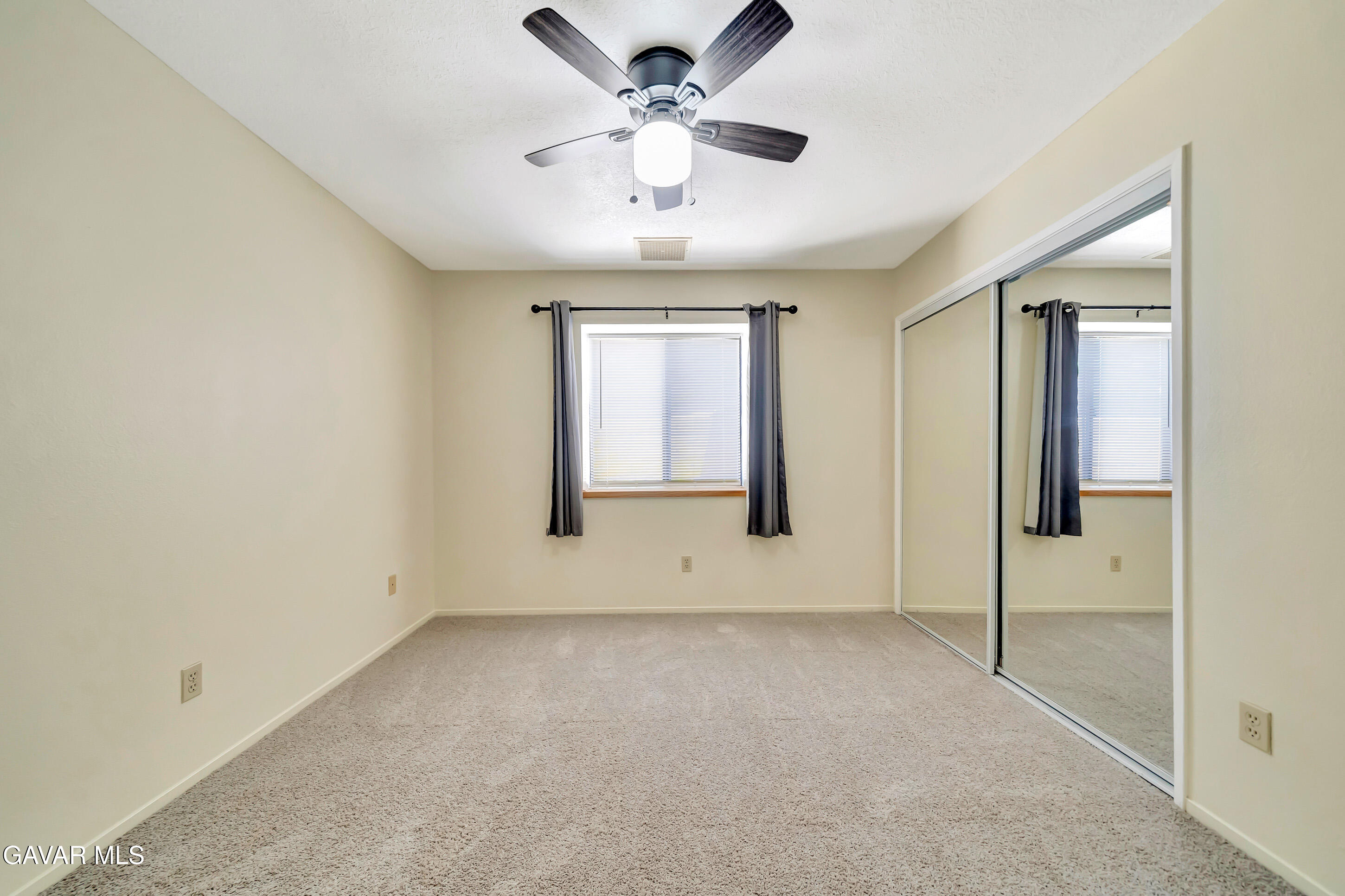 729 North Sunland Drive Ridgecrest, CA 93555 - Photo 35 of 52 a view of an empty room with a window