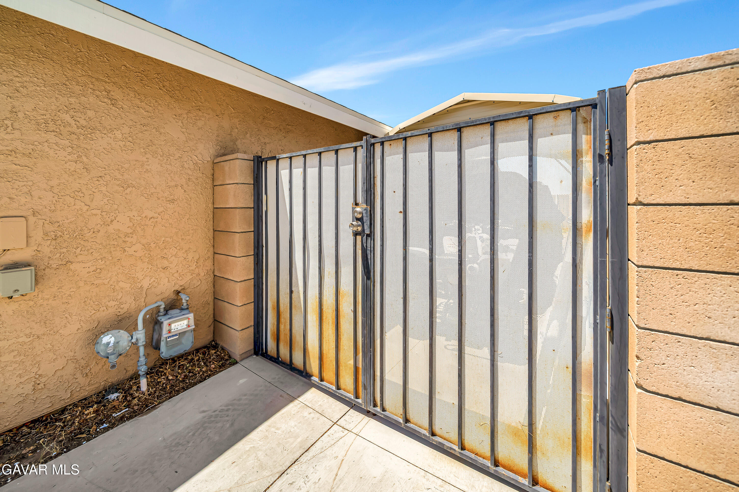 729 North Sunland Drive Ridgecrest, CA 93555 - Photo 47 of 52 a view of a porch with wooden floor